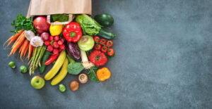 Shopping bag full of fresh vegetables and fruits / blog- heart-healthy